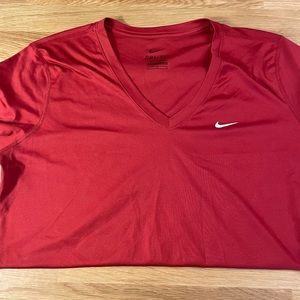 Women’s Red Nike Dri Fit V-neck Medium T-shirt.